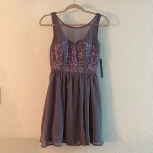 Gray dress with purple sequins
